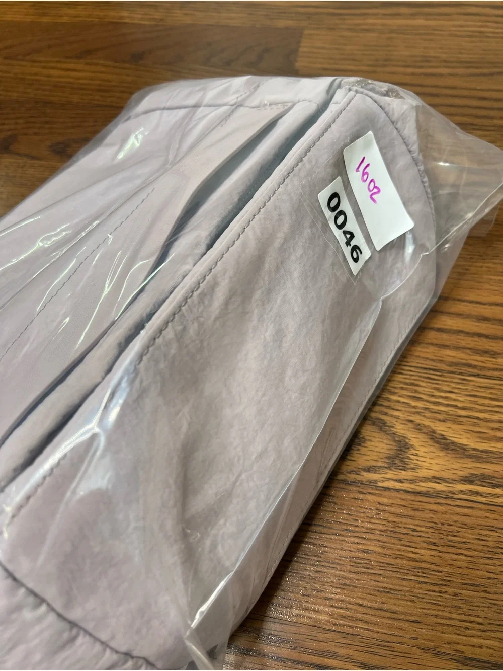 Lululemon On My Level Crossbody Bag in a light purple shade